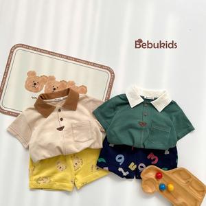SB2232- bộ polo diễu chỉ nổi túi ngực phối quần gấu, chữ số
