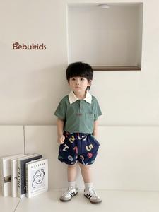 SB2232- bộ polo diễu chỉ nổi túi ngực phối quần gấu, chữ số