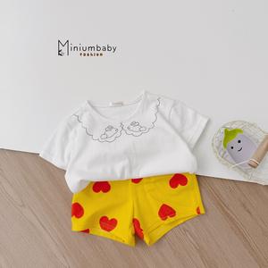 Bộ bé gái cộc tay in cổ thỏ phối quần tim