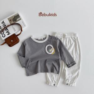 Bộ dài tay in hình logo O ngực