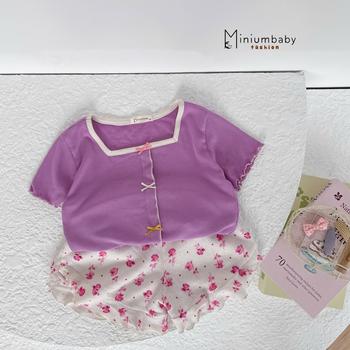 Bộ cộc tay cổ vuông đính nơ nẹp thân trước phối quần hoa