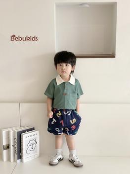 SB2232- bộ polo diễu chỉ nổi túi ngực phối quần gấu, chữ số