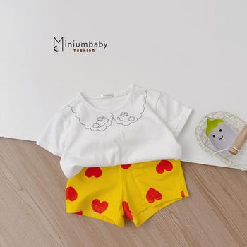 Bộ bé gái cộc tay in cổ thỏ phối quần tim