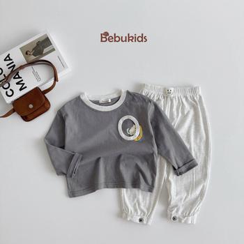 Bộ dài tay in hình logo O ngực