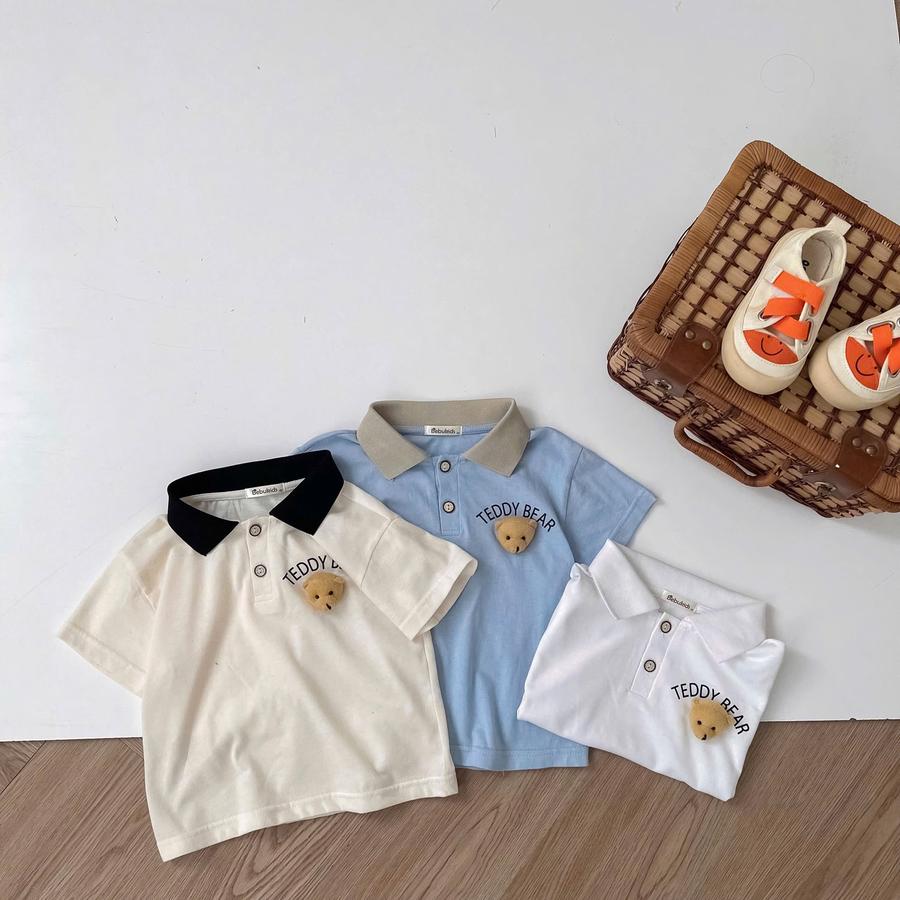 SB2343- bộ polo cọc tay in chữ ngực đính mặt gấu