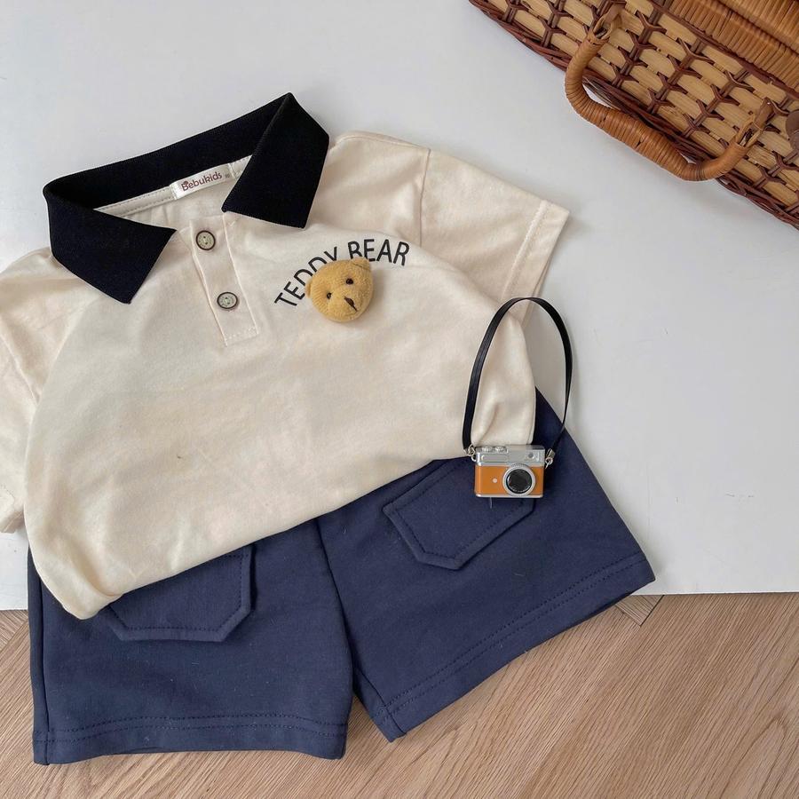 SB2343- bộ polo cọc tay in chữ ngực đính mặt gấu