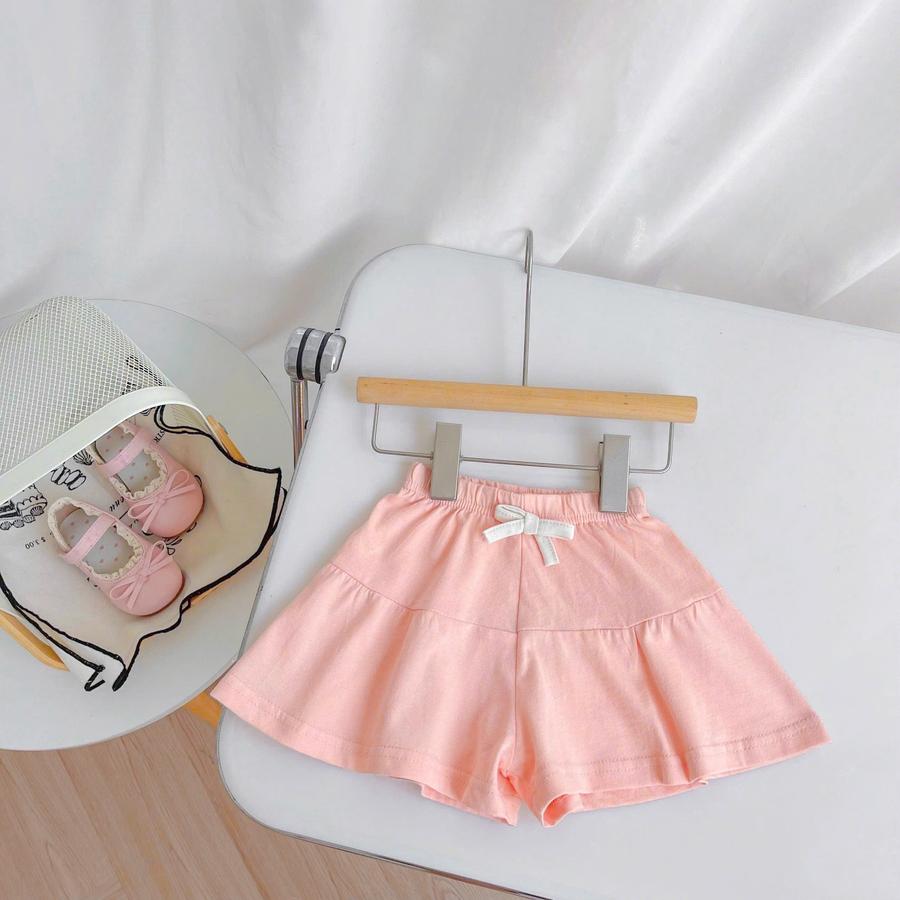 V2427- quần váy bé gái cam