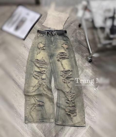 Product image - Quần jena rách loang nâu