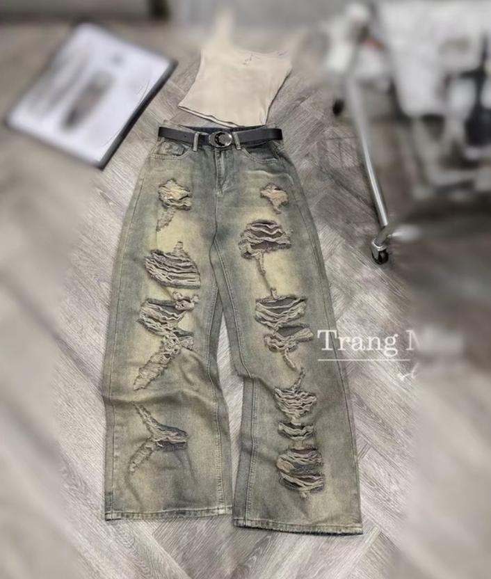 Product image - Quần jena rách loang nâu