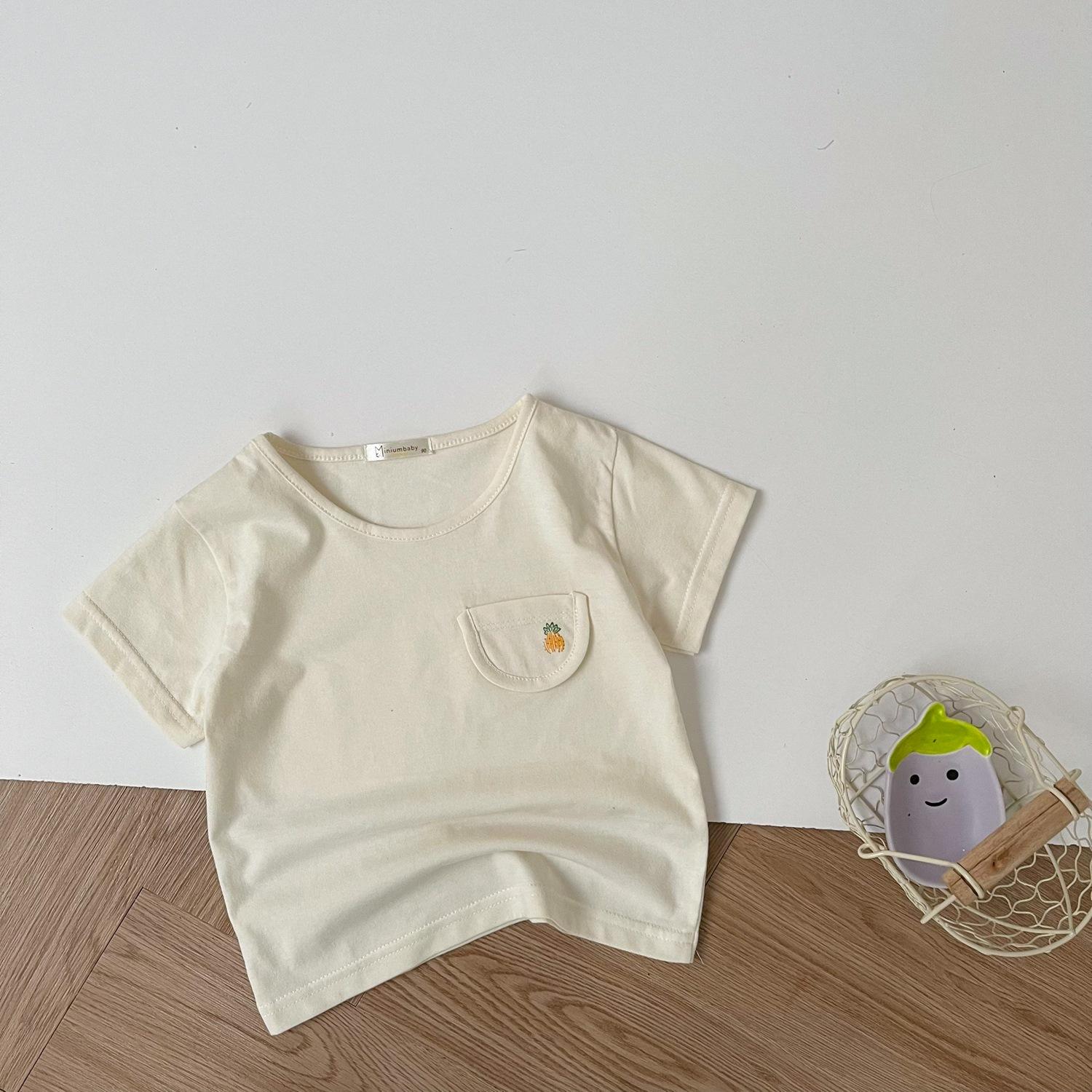 A1608- áo cộc tay túi ngực in quả túi kem