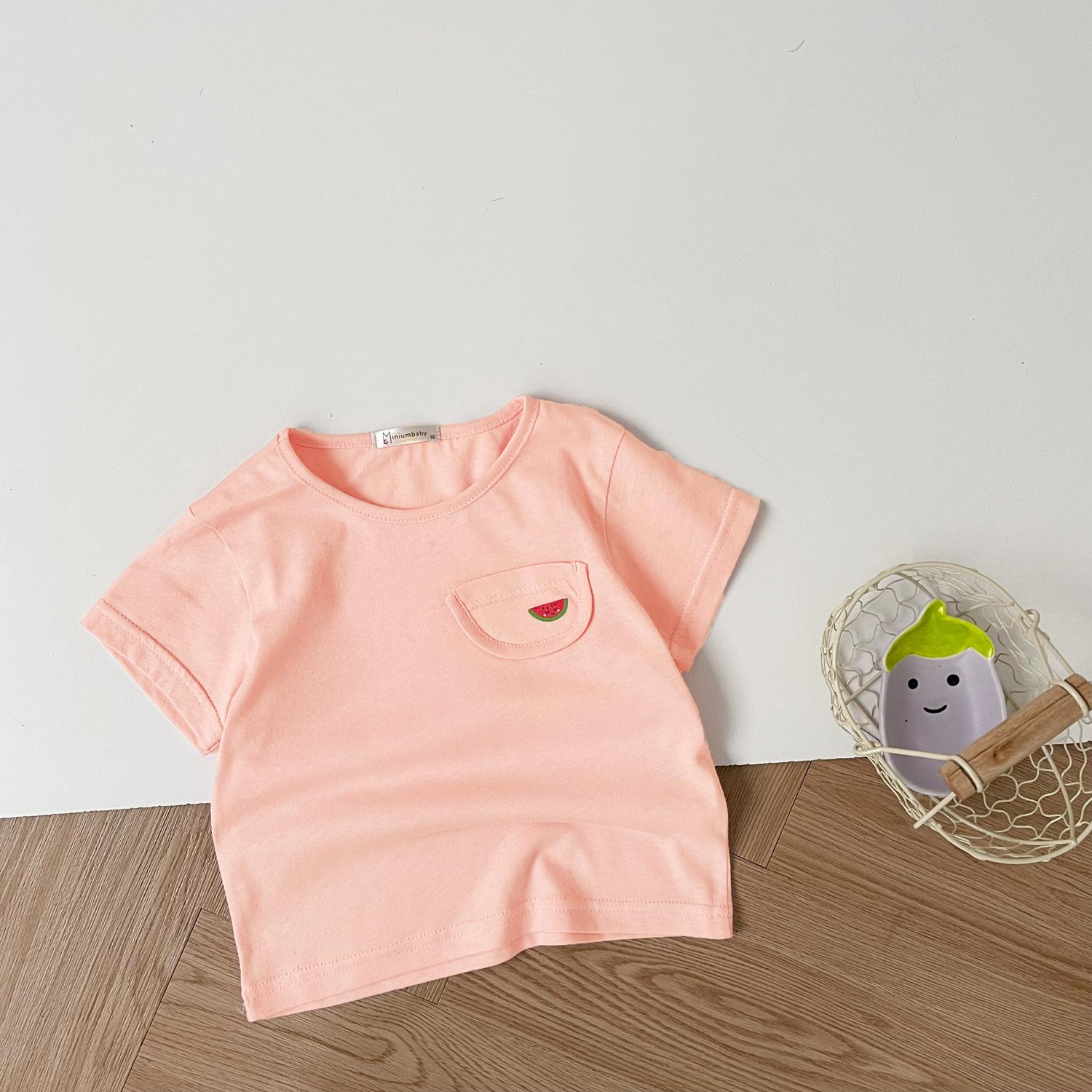 A1608- áo cộc tay túi ngực in quả túi cam nhạt