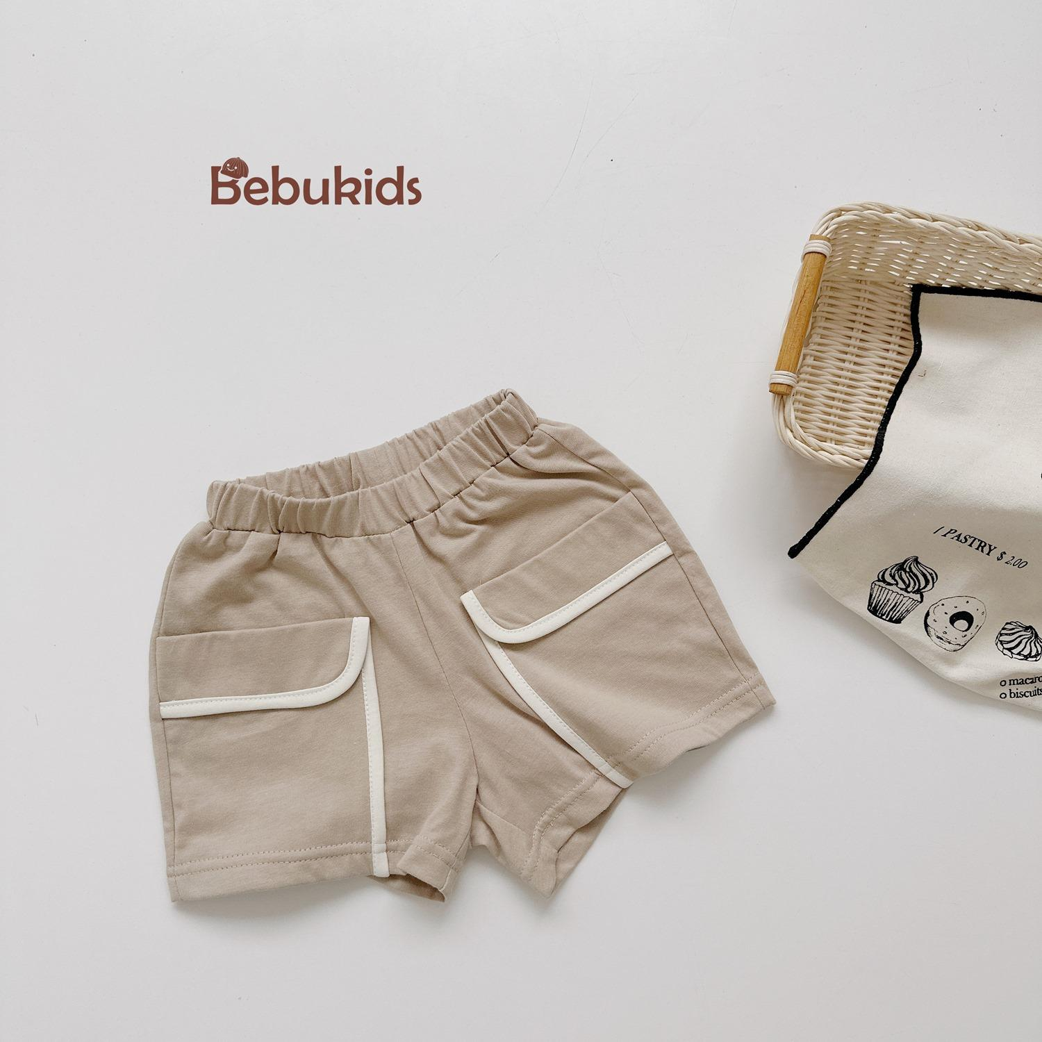 QC2301- quần đùi viền túi bé trai be