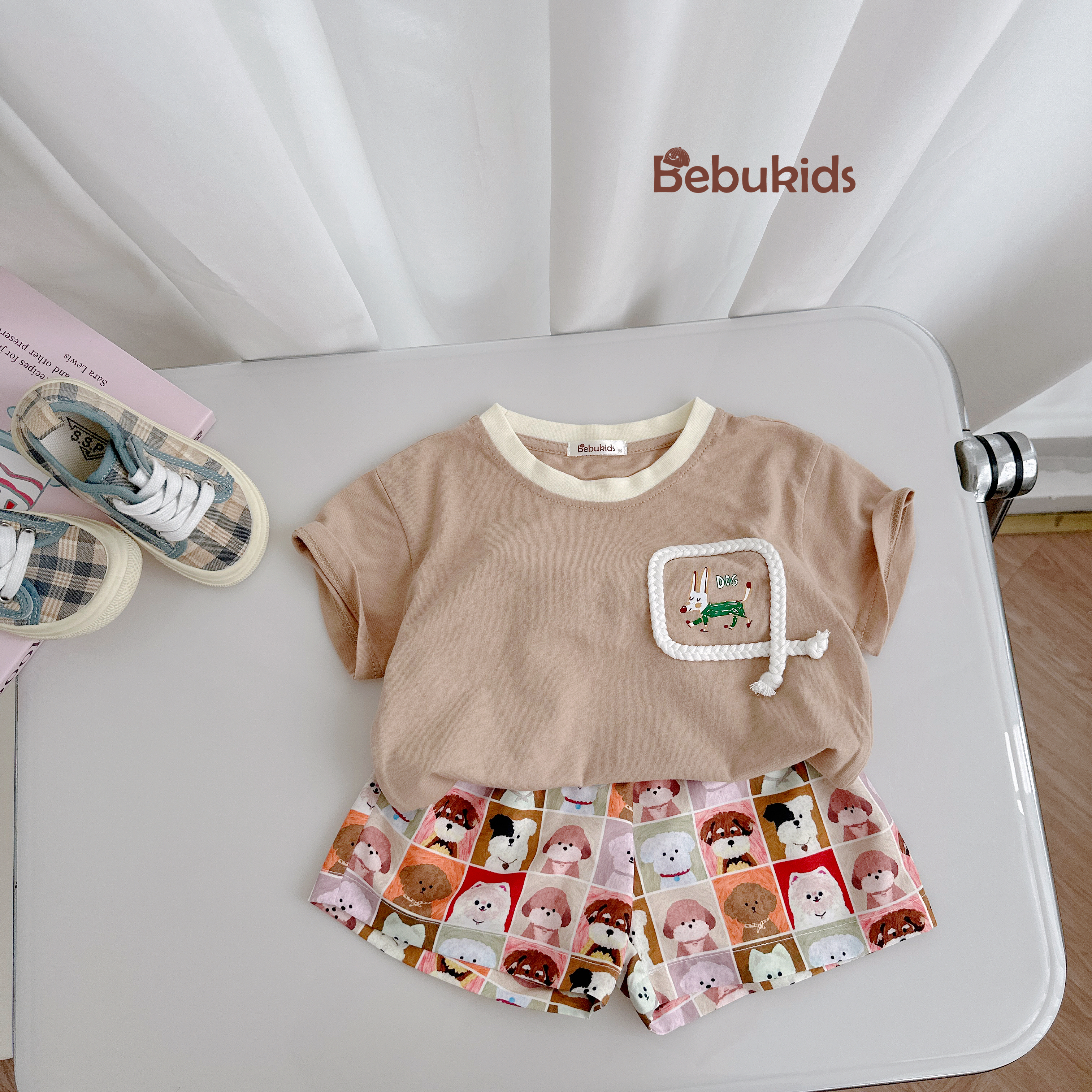 SB2330- bộ cộc tay túi viền dây in chú cũn phối quần karo cún nâu