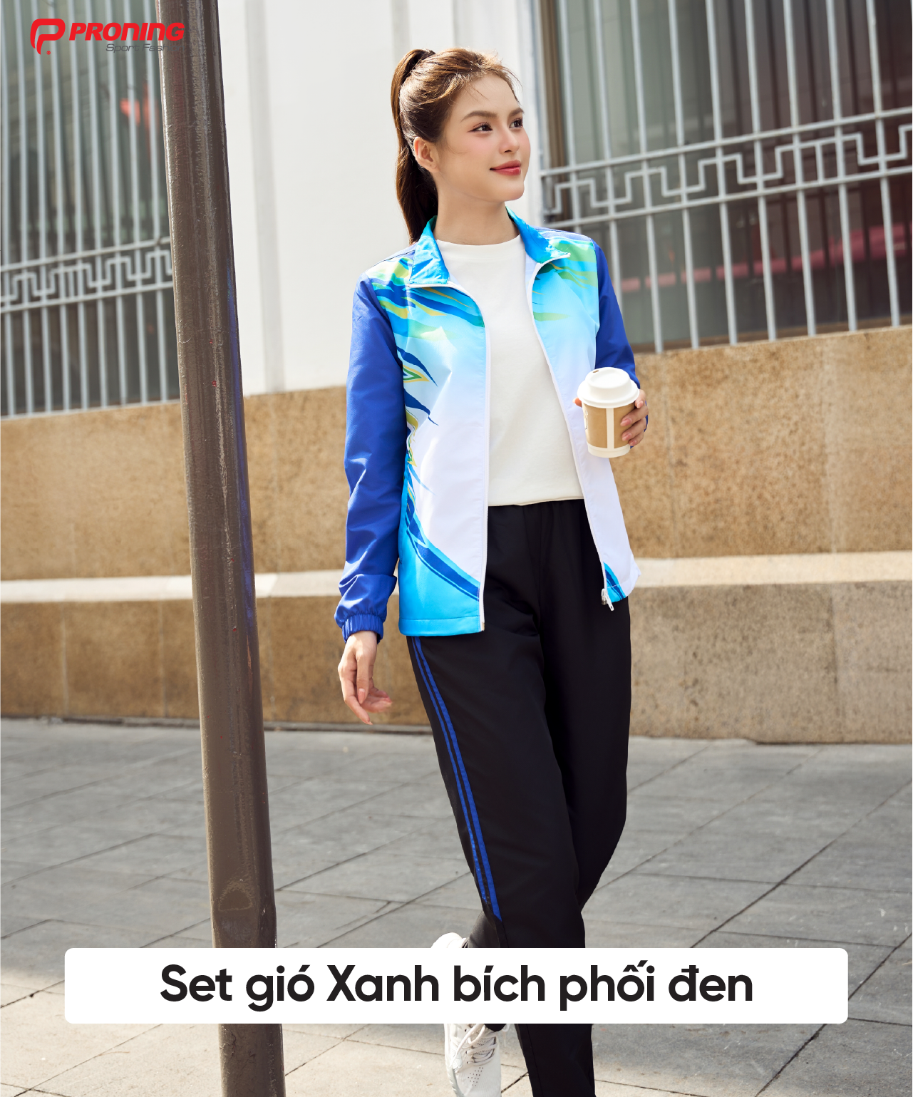 Product image - Bộ suvec gió thể thao nữ Xanh bích phối đen