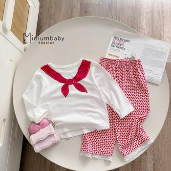 Bộ dài tay bé gái in cổ thắt nơ quần tim bi