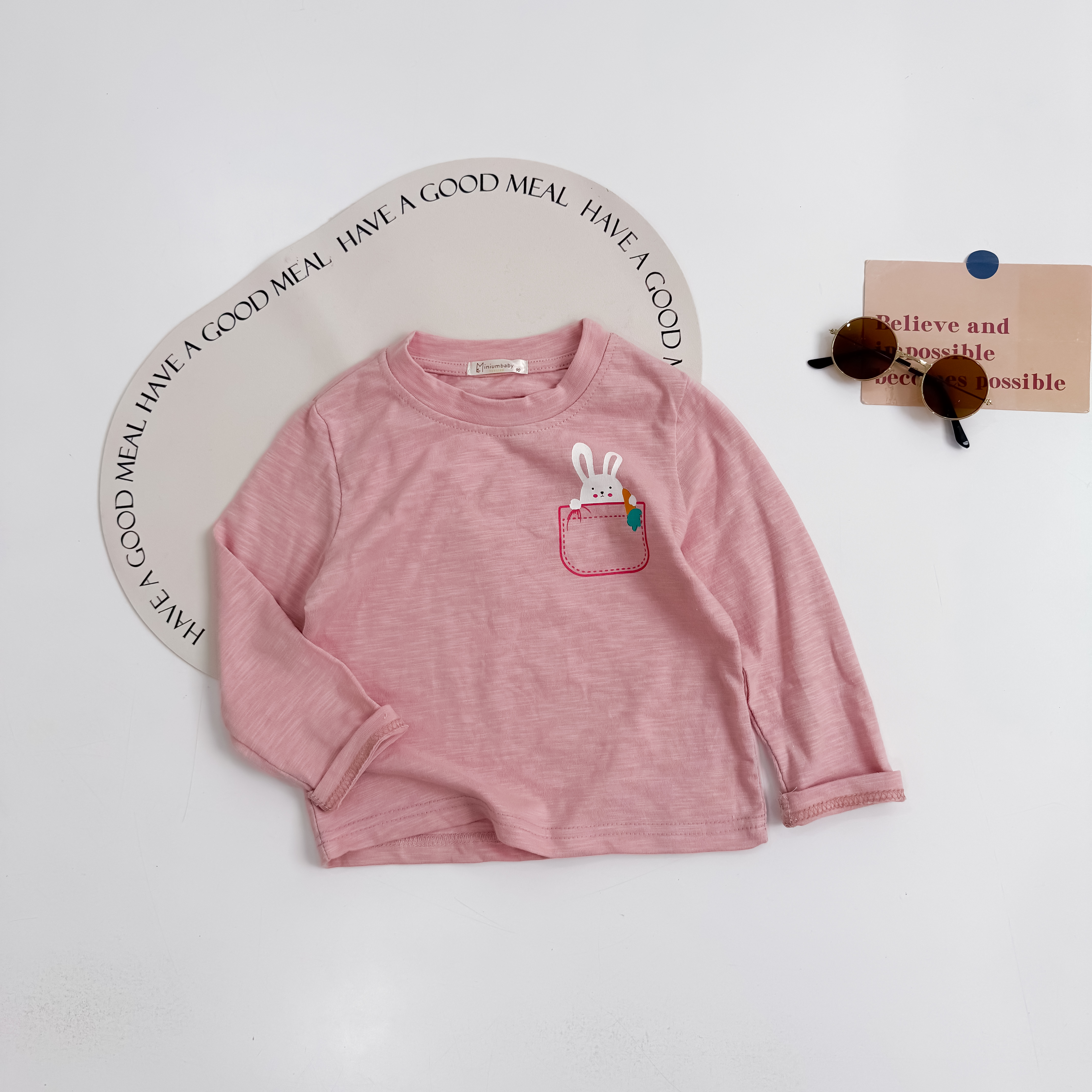 A1663- áo cổ tròn in túi, đầu thú via thường hồng