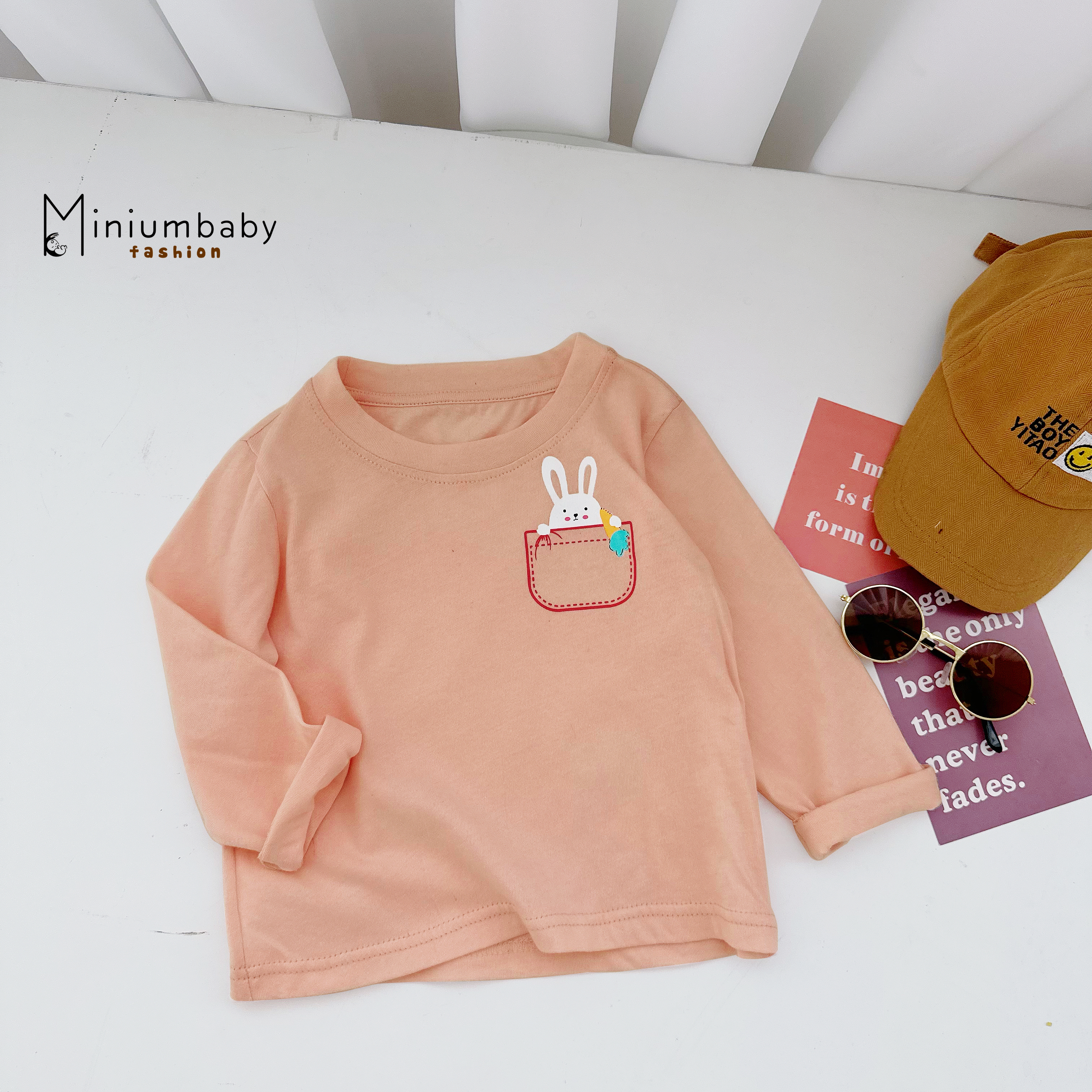 A1663- áo cổ tròn in túi, đầu thú via thường cam đậm