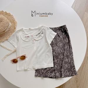 Bộ cộc quần lỡ bé gái có cổ