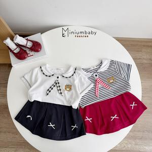 Bộ cộc quần váy bé gái có cổ in hình