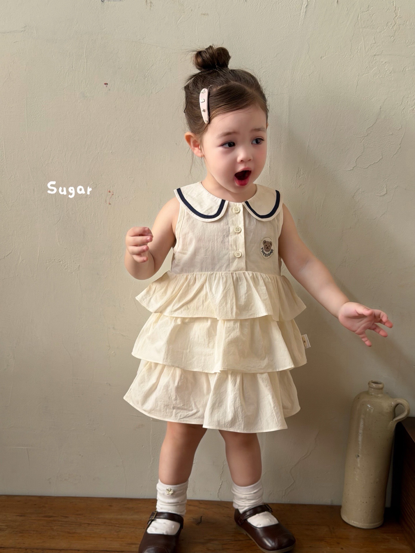 váy trắng kem tầng cổ polo sugar