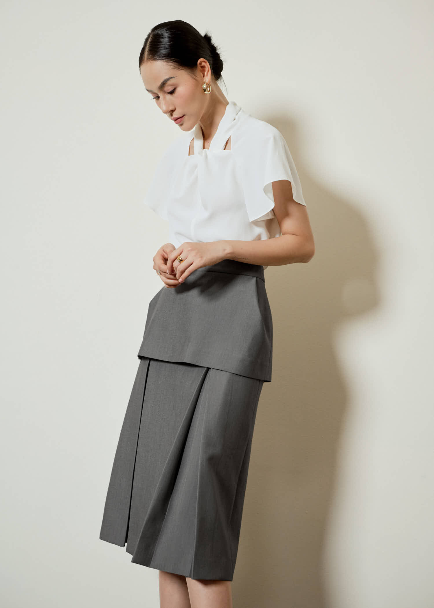 Pleated peplum skirt