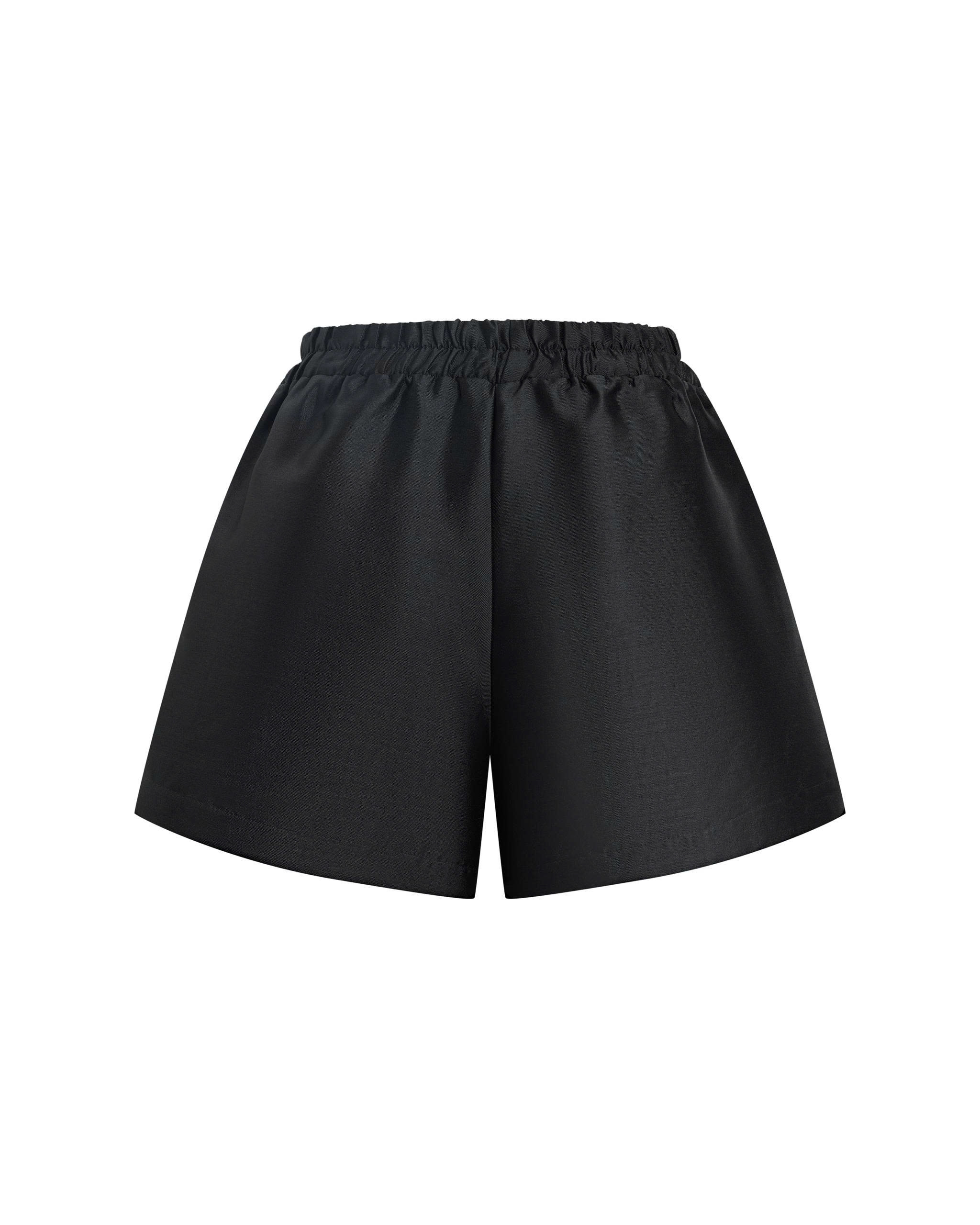 Ảnh form quần short bigsize QS011 lưng thun cao ống rộng màu đen hoặc hồng pastel