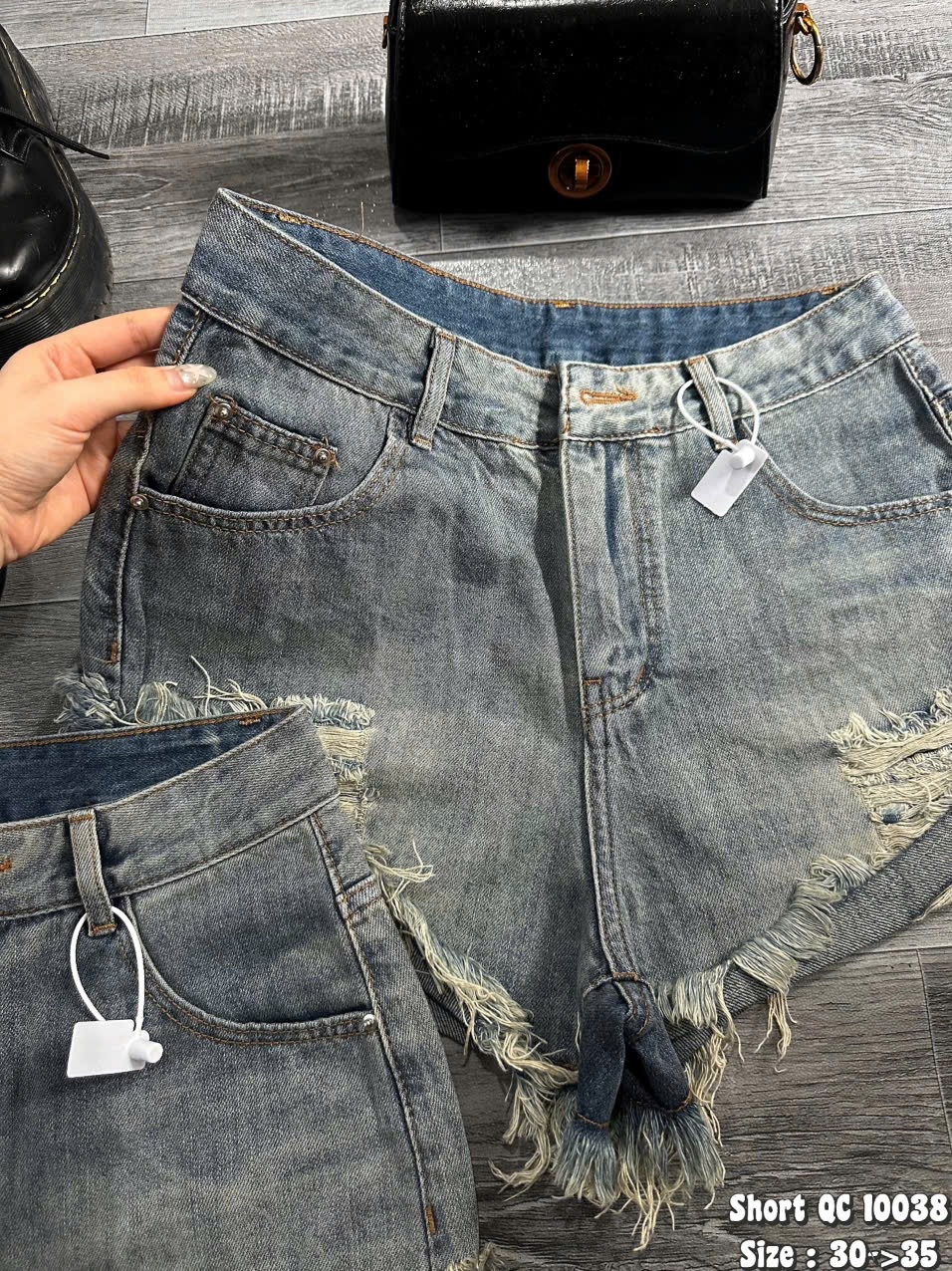 Chi tiết cạp cao túi trước và lai rách quần short jean bigsize T-QSJ10038