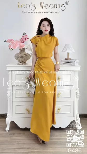Product image - G486-Sét áo lụa cổ chéo xếp ly đính cúc hoa, tay ngắn+Chân váy dài vàng