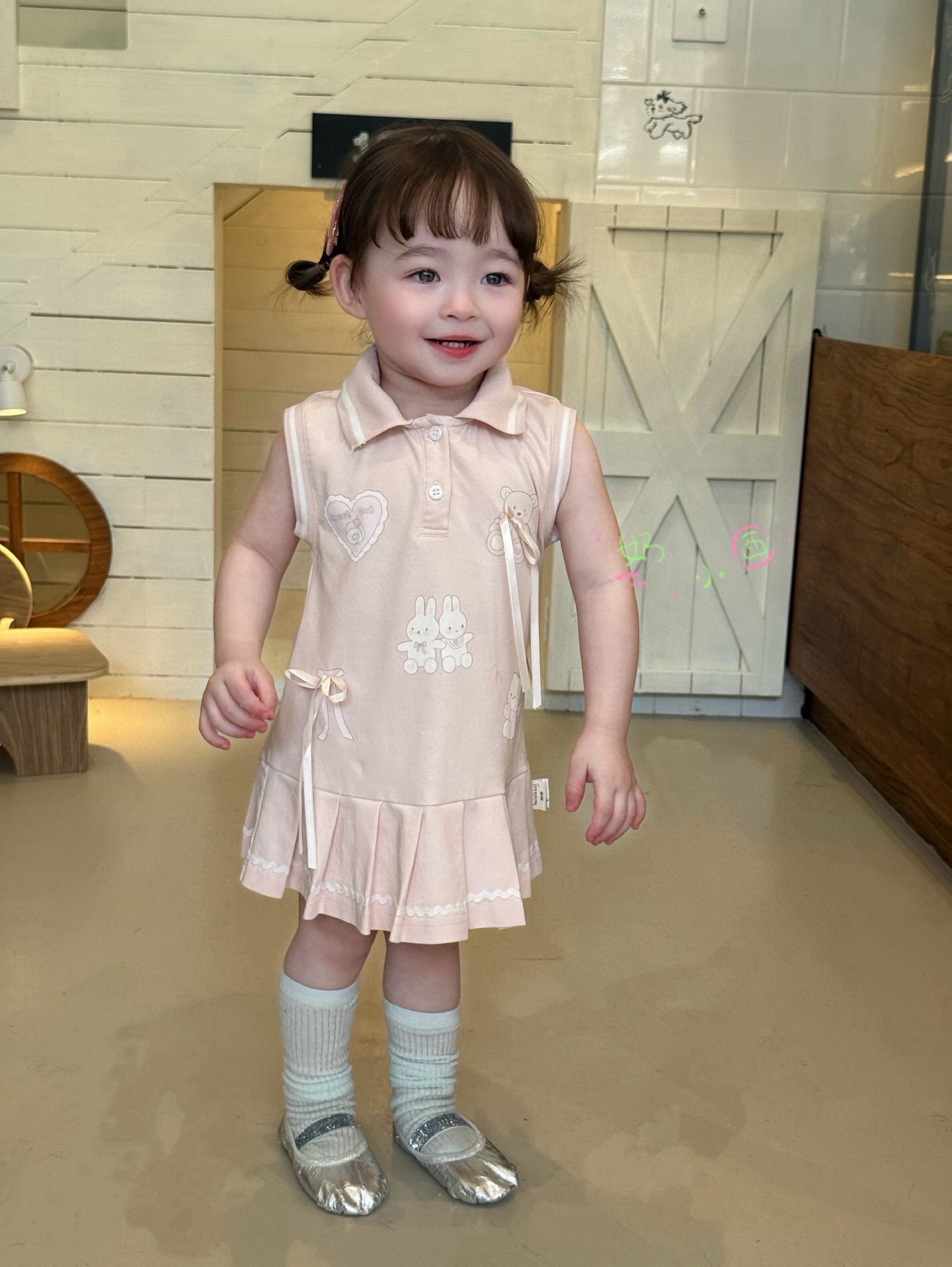 váy polo thun đính nơ hồng naixiaoxi