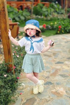 Bộ cộc quần váy bé gái không cổ in hình
