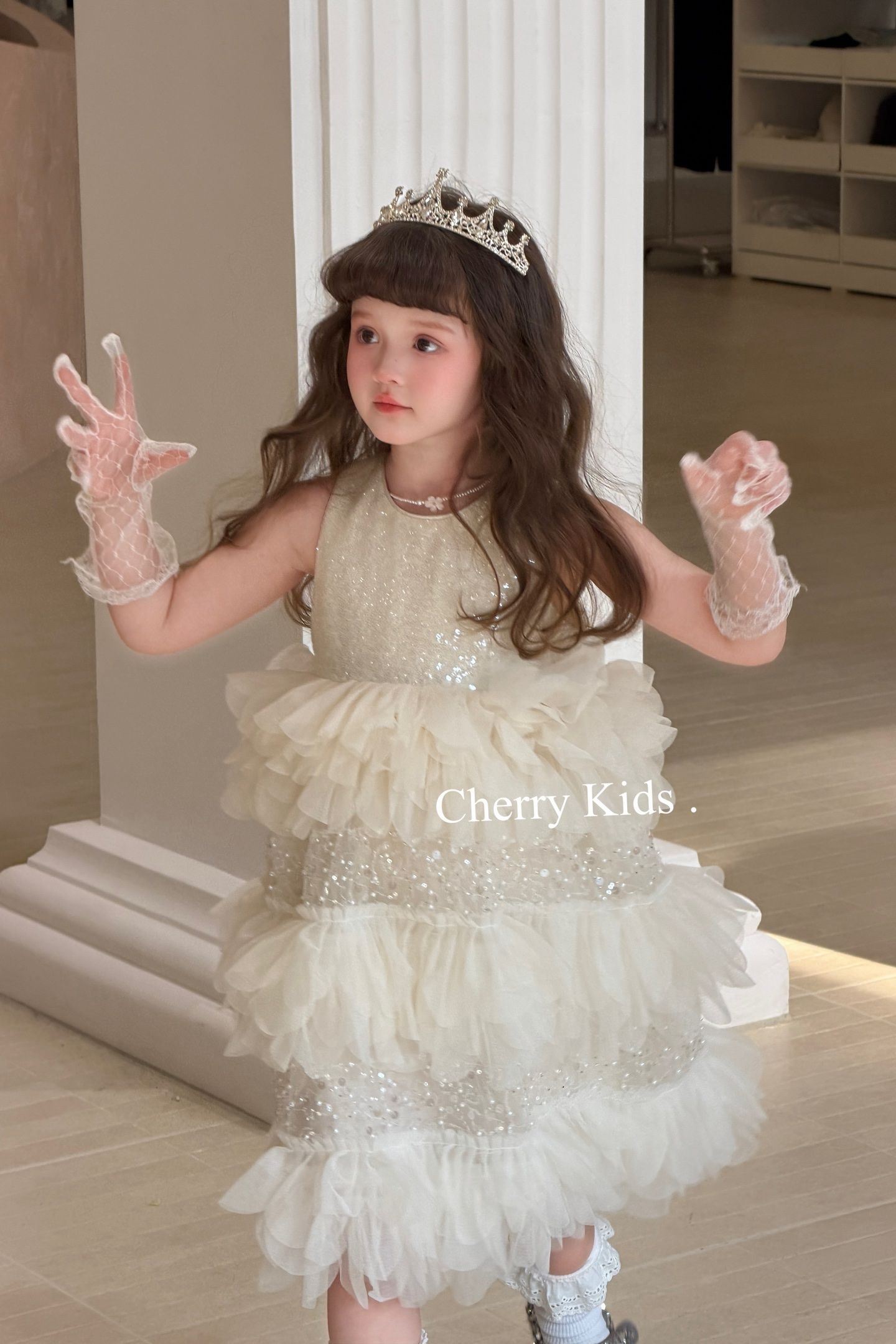 Cherry Kids- Đầm hoa rơi ánh bạc màu Kem