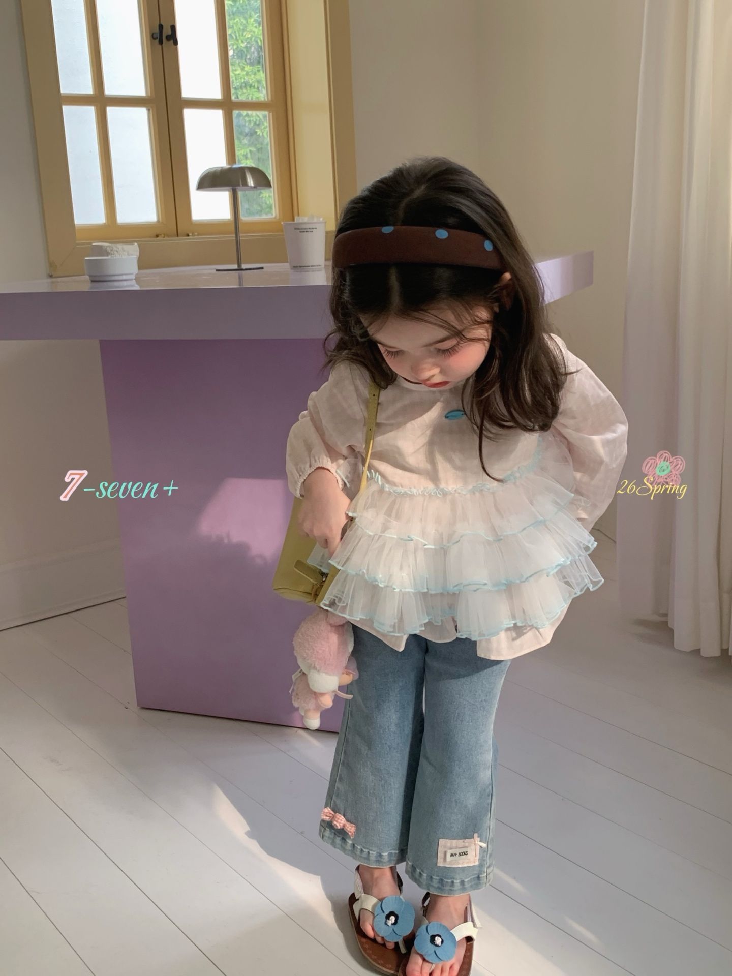 Quần denim 7-seven gấu loe nơ hồng MH