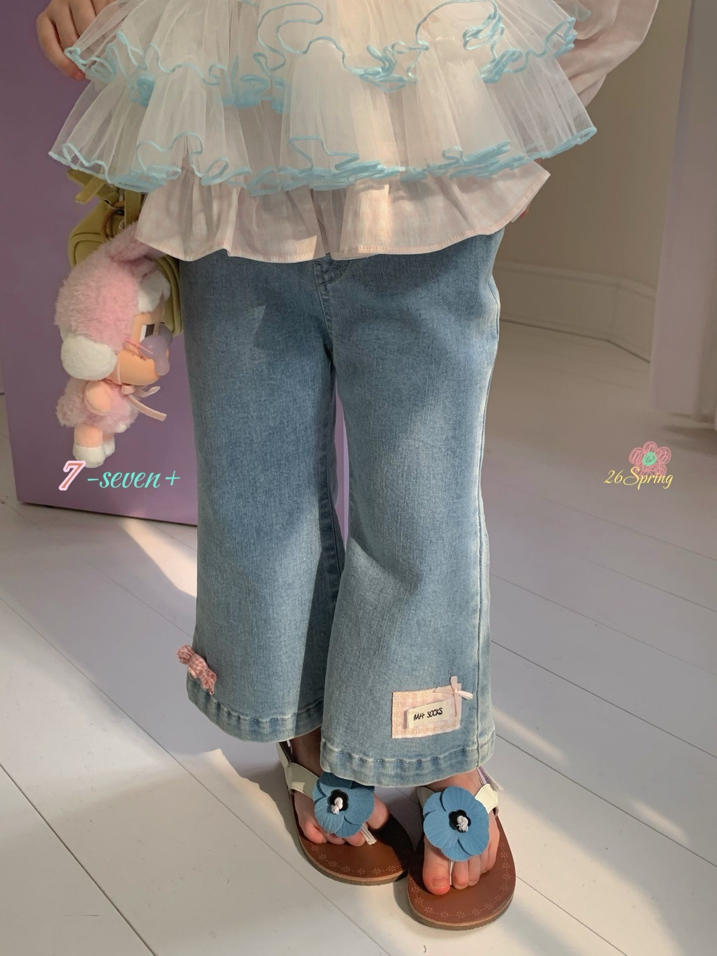 Quần denim 7-seven gấu loe nơ hồng MH