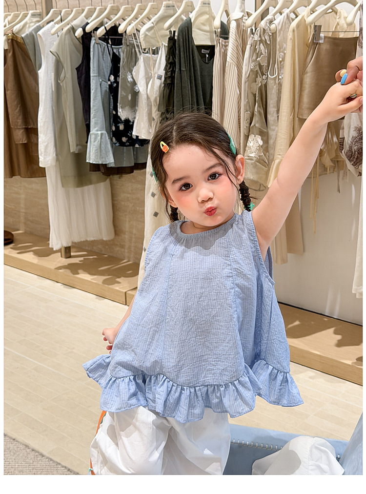 cổ tròn - Áo caro xanh gấu loe bèo