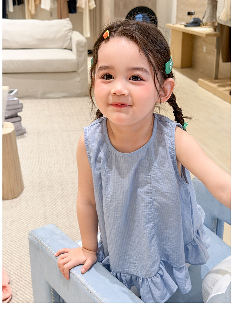 cổ tròn - Áo caro xanh gấu loe bèo