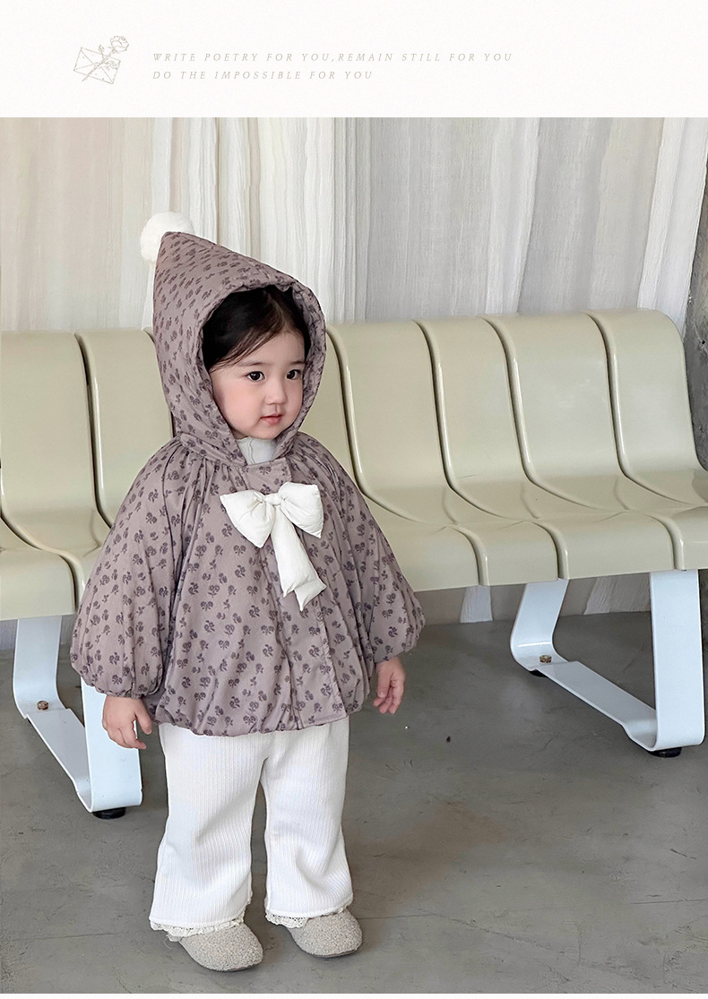 Áo khoác hoa nâu đính nơ trắng