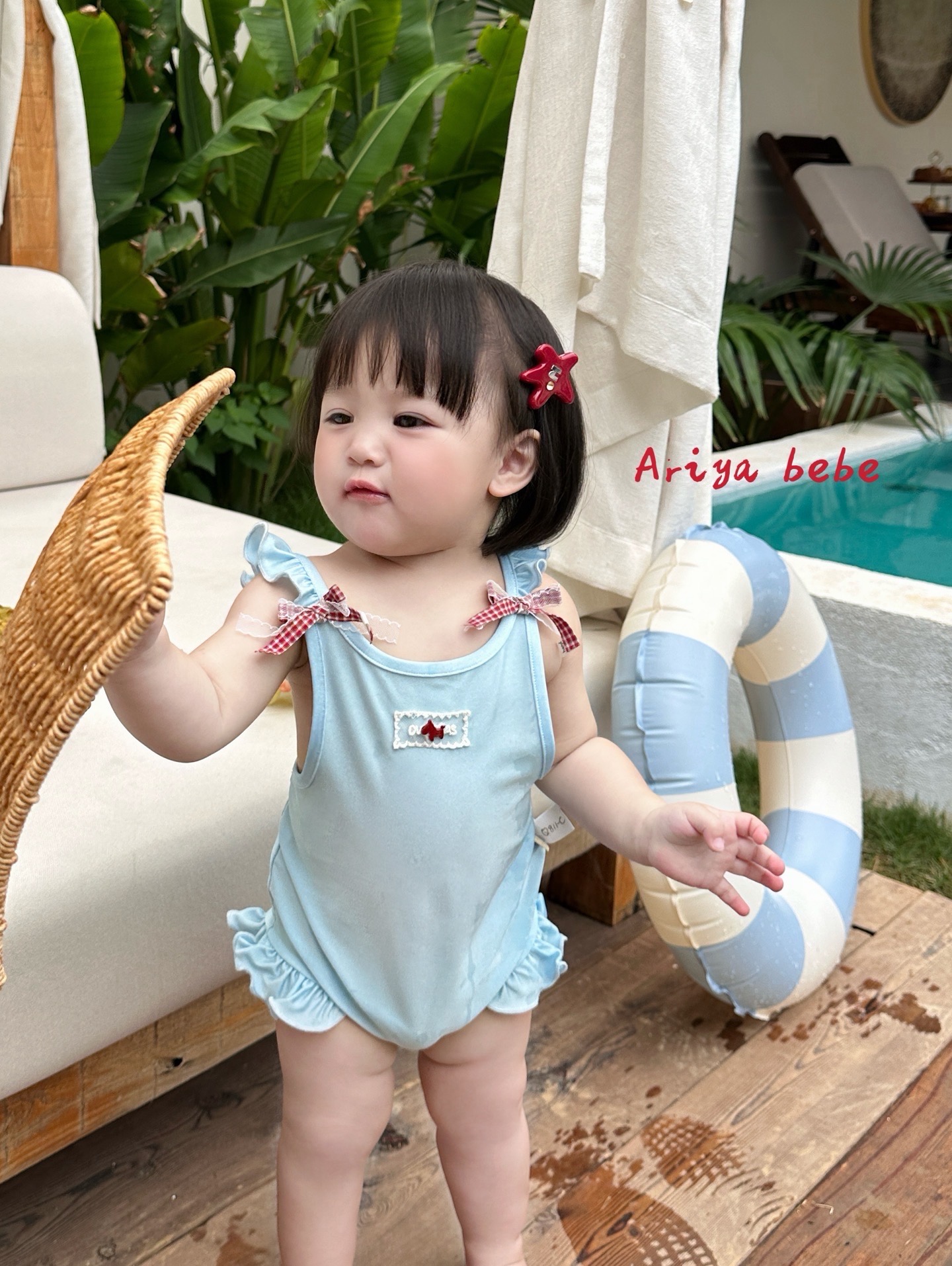 suit bơi xanh biển nơ đỏ ariya