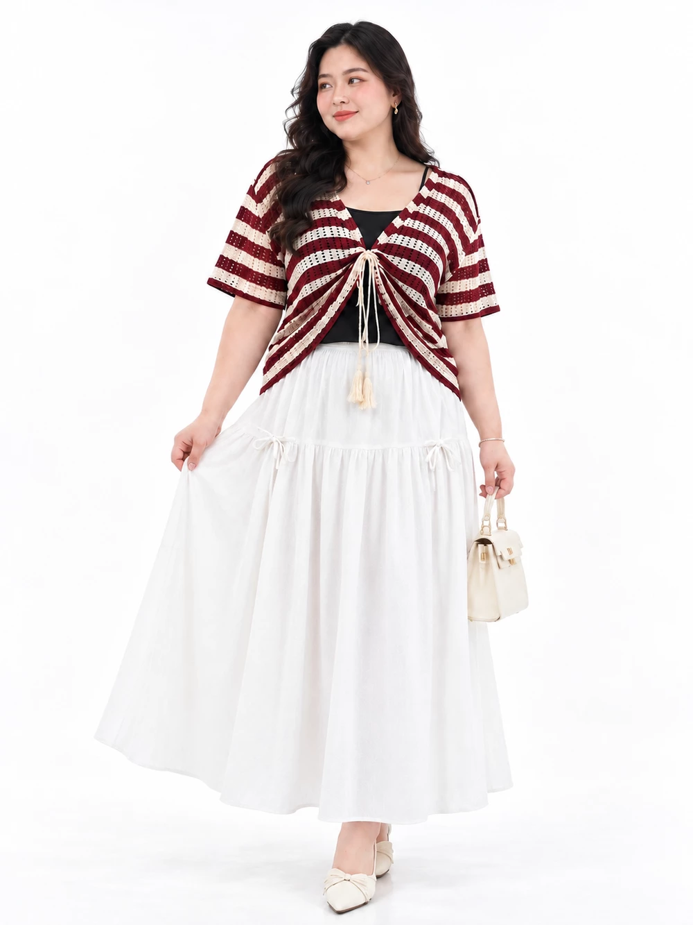 Model wearing V-AK132 with a burgundy and cream striped tie-front top, black camisole and white skirt