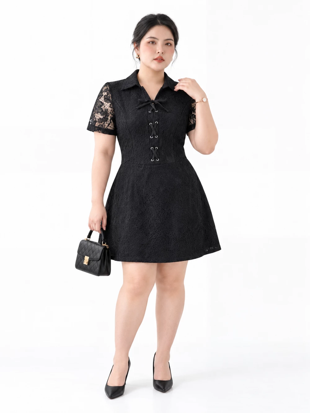 Model wearing the black V-DA248 A-line lace dress with shirt collar and lace-up eyelets, holding a black bag