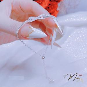 LT67 - Lắc tay nơ đá dây rút