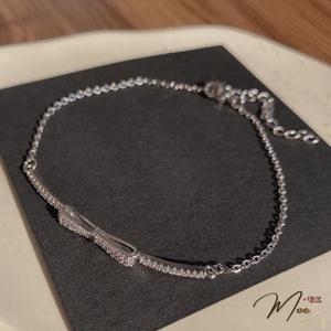 LT67 - Lắc tay nơ đá dây rút