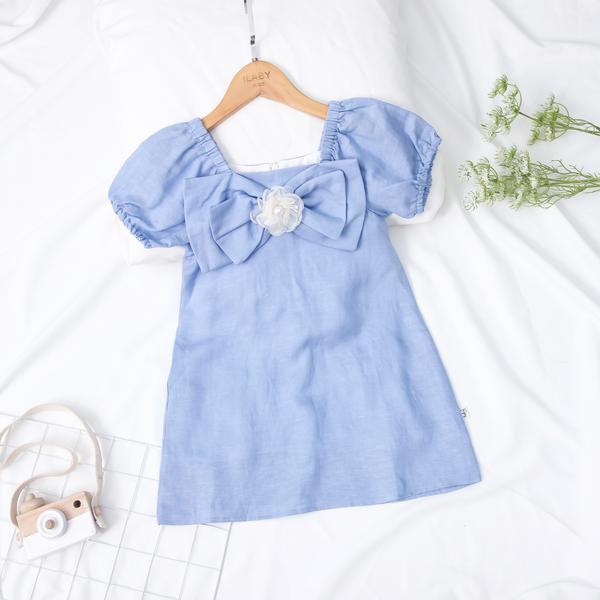 Váy suông nơ ngực cài hoa