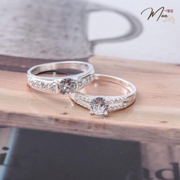 ĐN29 - Nhẫn đôi đá chủ viền đá hạnh phúc