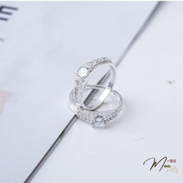 ĐN29 - Nhẫn đôi đá chủ viền đá hạnh phúc