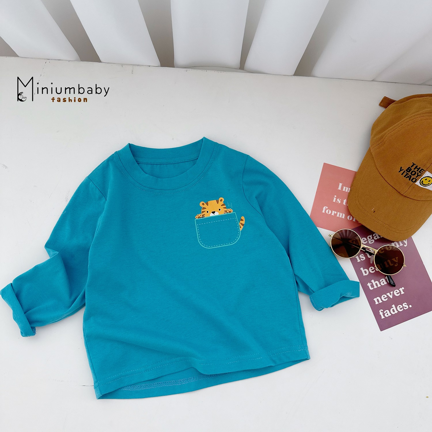 A1663- áo cổ tròn in túi, đầu thú via thường