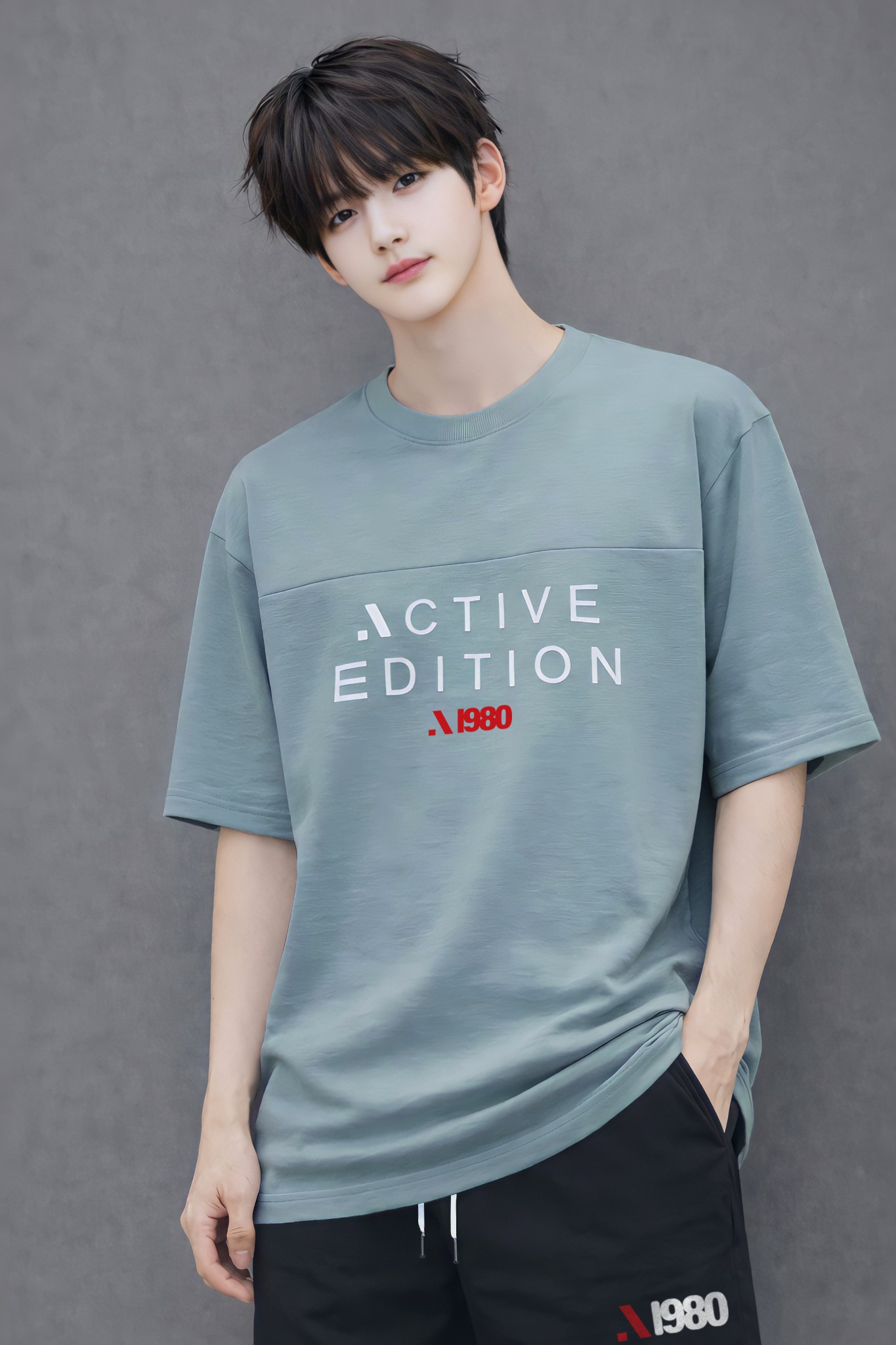 Áo phông bé trai dáng rộng màu xanh xám phối ngực in chữ