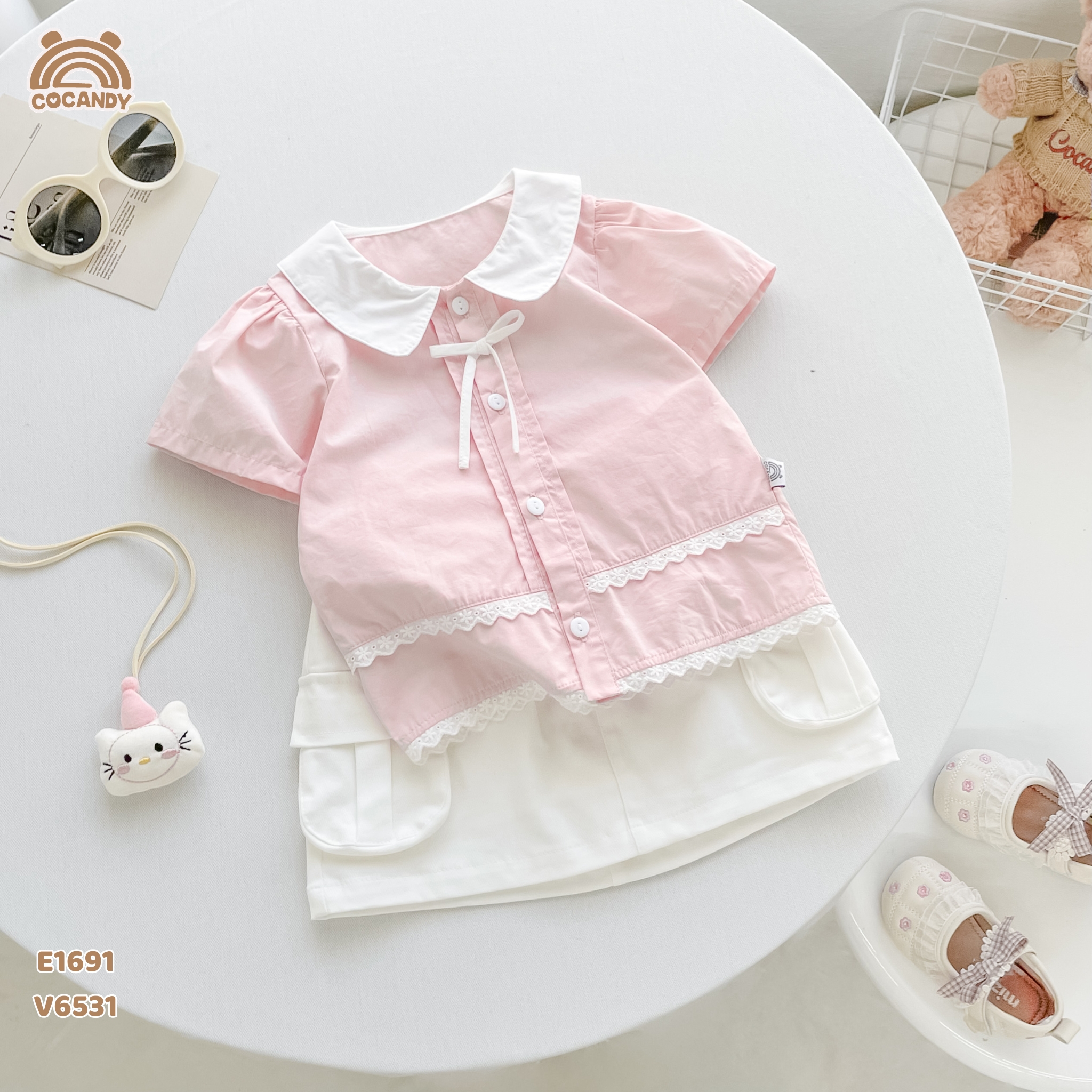 Chân váy cộc kaki TRẮNG chữ A túi cạnh