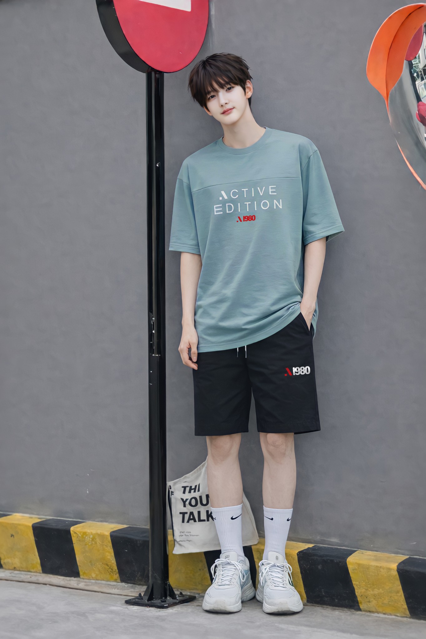 Áo phông bé trai dáng rộng màu xanh xám phối ngực in chữ