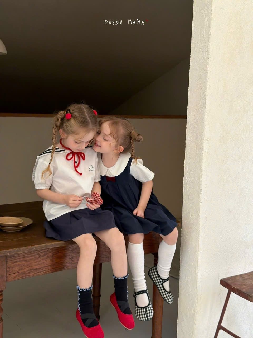 SP06 - Set áo cổ thủy thủ in mèo trắng phối chân váy xếp ly hãng Supper Mama