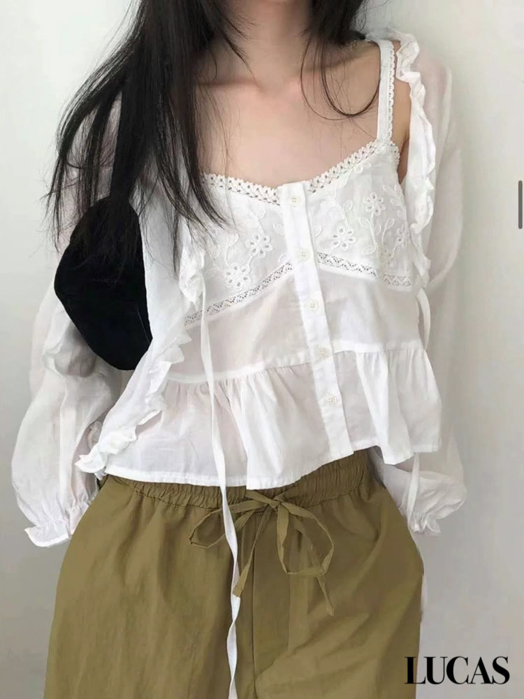Áo sơ mi thô thêu hoa ngực phối viền ren chân ngực, cúc trắng 2 dây quai bản lớn gấu xòe